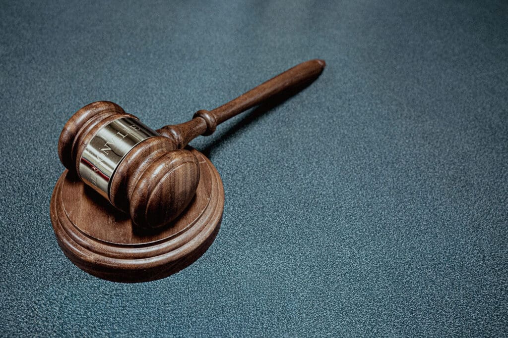 A wooden gavel and sound block, symbolizing the Hendersonville board's unanimous vote to approve the Bradford-Berry House partnership.